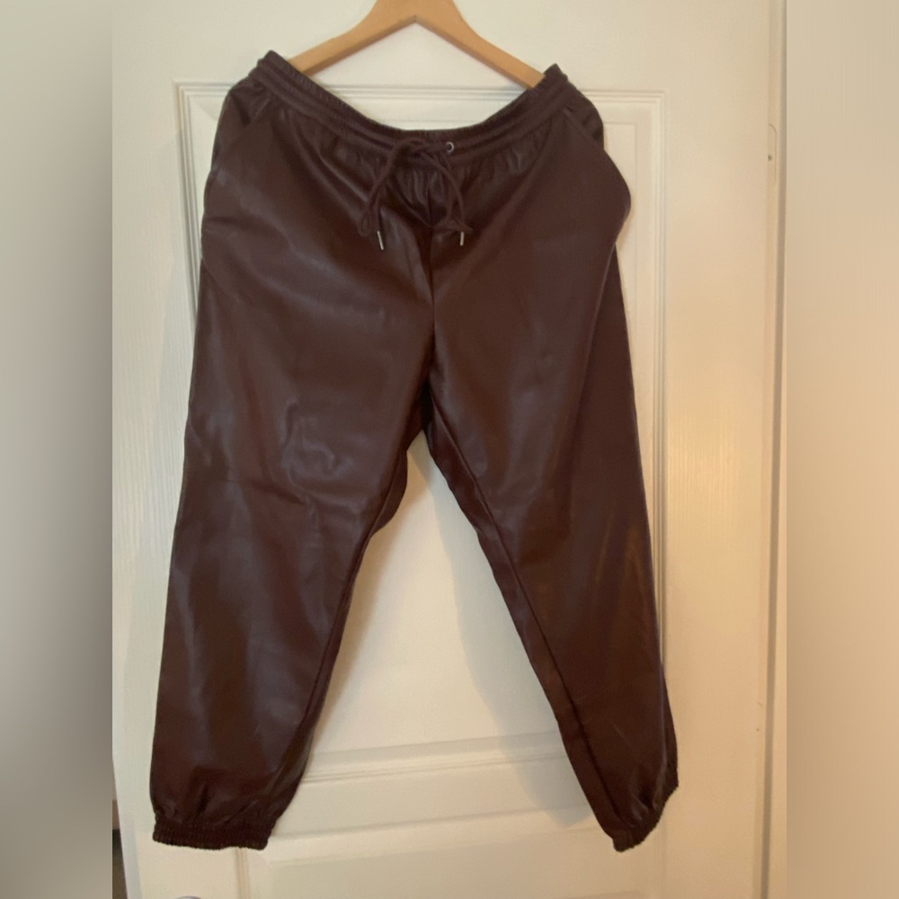 TWO PAIRS - Faux leather pull on joggers. Black and Maroon. Size L.